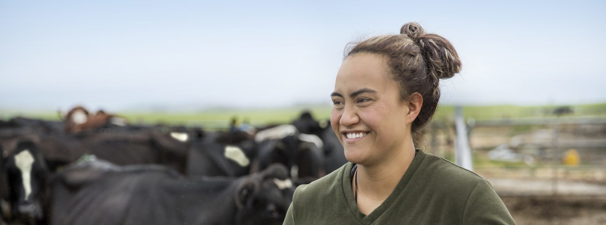 Farmer standing with cattle